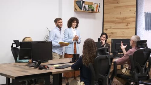 Group of Business People Discussing Project in Office