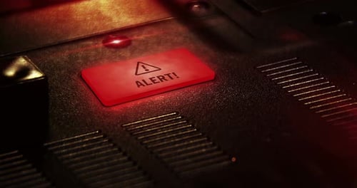 Red Alert Button on Futuristic Panel