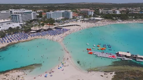 Aerial View of Ayia Napa Coastline with Resorts and Turquoise Waters