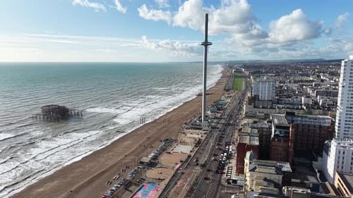 Brighton i360 beach and town drone,aerial sunny day blue skys