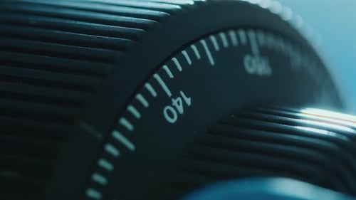Macro Shot of Turning Adjustment Knob on Laboratory Microscope