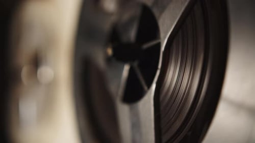 An Old Audio Tape Reel Spinning Sound Magnetic Tape