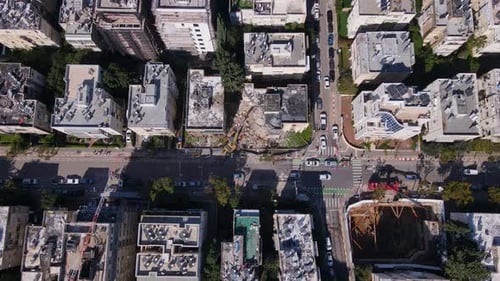 Top View Of Building Demolition Site Along Road In Tel Aviv-Jaffa, Israel. aerial shot