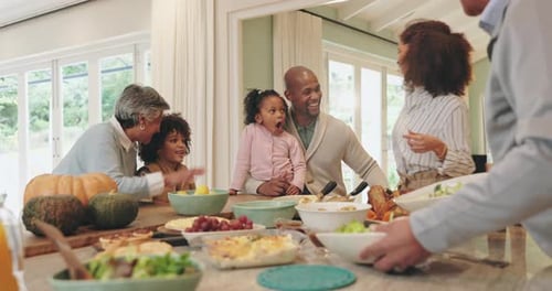 Happy Family Gathered Around Food at Home