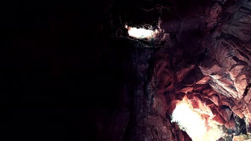 A Cave Filled with Lots of Dark Rocks
