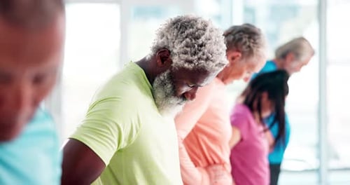 Adults Stretching Their Necks Indoors