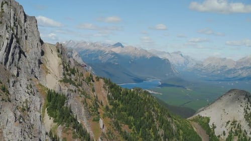 A thrilling helicopter tour of the Canadian Rocky Mountains, breathtaking aerial views of snow-cappe