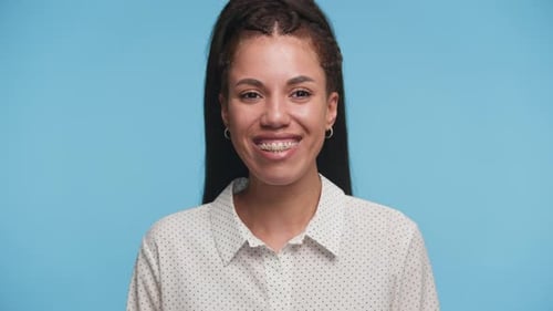 Woman Smiling with Braces Close Up