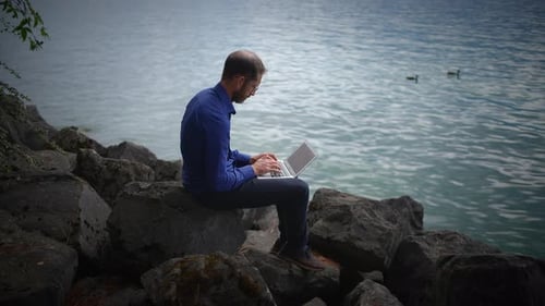 Enjoying Remote Work By the Tranquil Water A Perfect Serene Escape for Balance and Focus