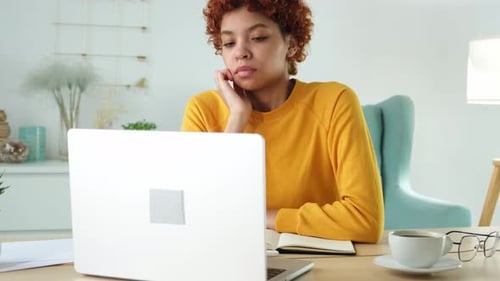 Sleepy Sad African American Woman Sitting at Table with Laptop Tired Overworked Girl Lazy to Work
