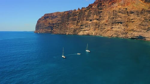 Los Gigantes cliffs in Tenerife Canary island. Aerial sea landscape. Seascape with huge rocks in dee