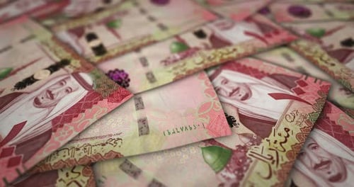 Saudi Arabia Rial 100 banknote flying over money surface