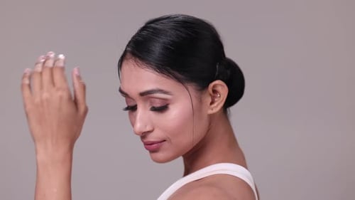 Young Woman Posing with Hand in Hair