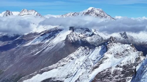 Saastal Saas Fee Ski Resort aerial drone Switzerland morning afternoon ice glacier autumn snow