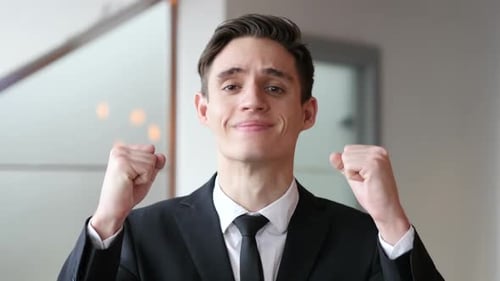 Young Businessman Celebrating Success