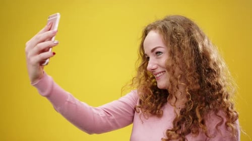 Confident Young Woman Selfie in Studio