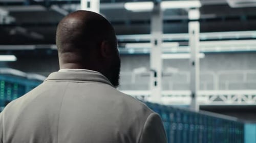 System Administrator in Data Center Doing Inspection on Infrastructure Tech