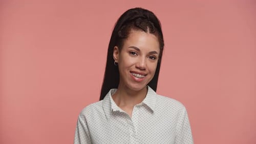 Smiling Woman Portrait with Braces and Ponytail
