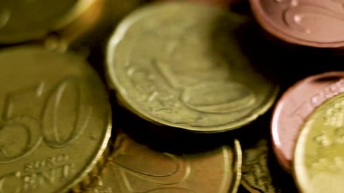 Euro Money Coins panning close up shot of various coins, European Union, 4K footage