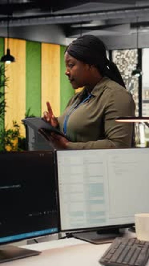 Vertical Video Software Developers Working in AI Startup Training Predictive Models