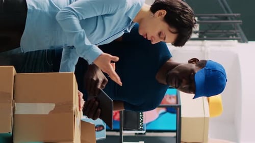 Stylish Worker Helping Deliveryman