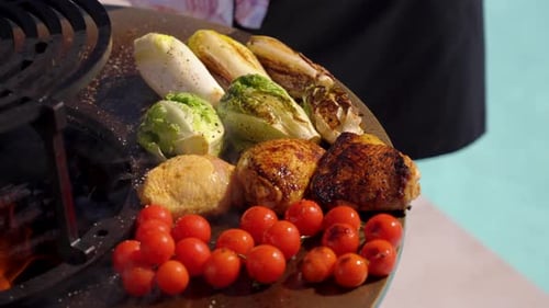 Grilled Chicken and Vegetables next to Swimming Pool