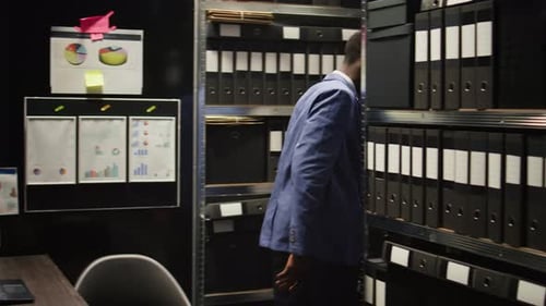 Professional Works with Computer in Modern Office