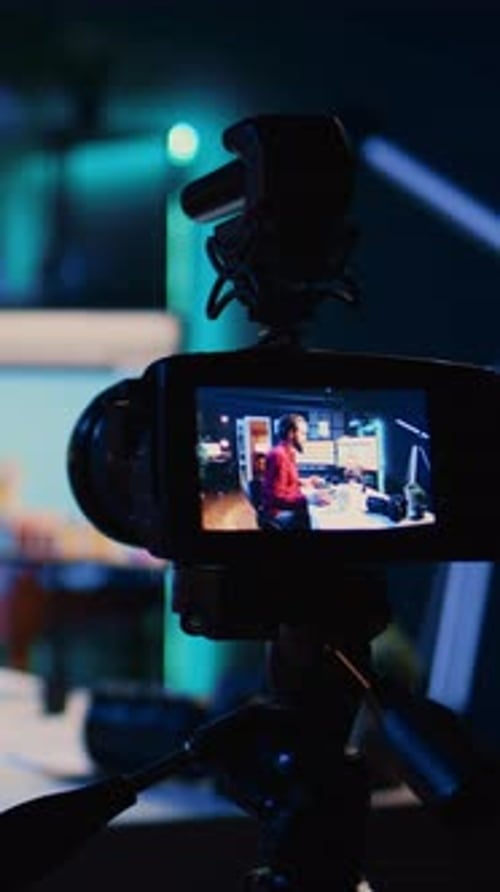 Vertical Video Close Up on Camera Recording Photographer Teaching Audience Photography Tips