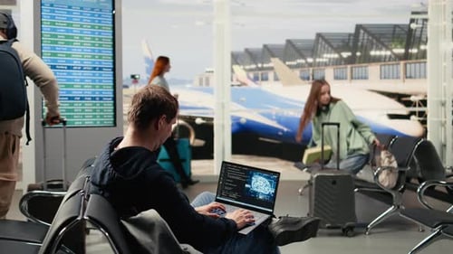 Travelers Wait at Airport Departure Lounge Using Devices