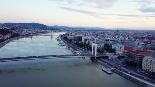 Budapest liberty statue and view of the early sun over the city