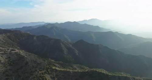 Mountain Range Aerial View with Winding Road