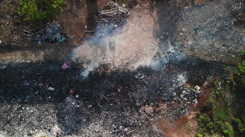 Burning Dump in Asia Pollution By Plastic Rubbish on Landfill Drone View