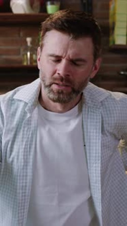 A Man in a Casual Setting is Showing a Deep Expression of Concern During a Discussion
