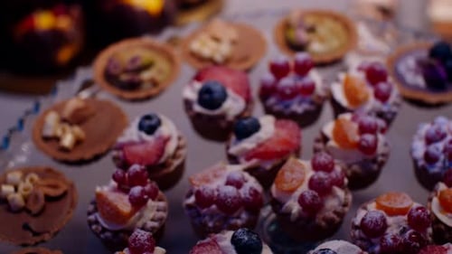 Assorted Fruit Tarts on a Glass Platter