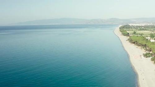 Aerial view of beautiful sea and beach at sunny day, Simeri Mare, Calabria, Southern Italy