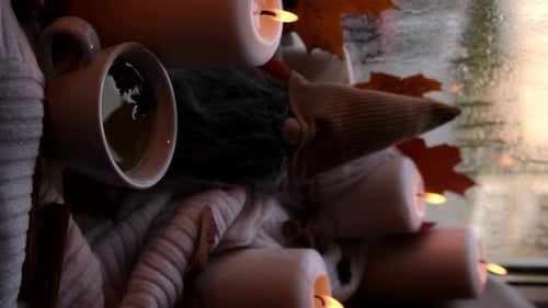 Cozy Still Life with Candles and Autumn Decor