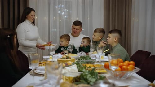 Family Together at Meal in Cozy Home Setting