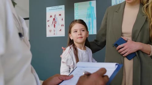 Child Patient with Doctor During Medical Checkup