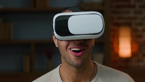 Young Man Amazed by Virtual Reality Experience