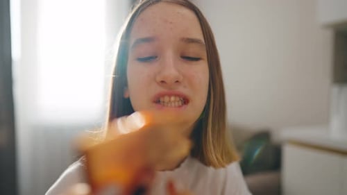Close Up Little Girl Eating Pizza Food Hungry Happy Young Woman is Eating Piece of Pizza Taking a