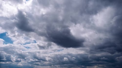 Timelapse of Cumulus Clouds Moves in the Blue Sky