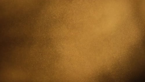 Golden Textured Background with Floating Dust Particles