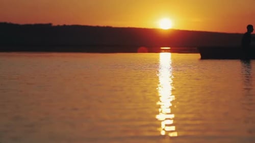 Romantic Couple on Boat at Sunset