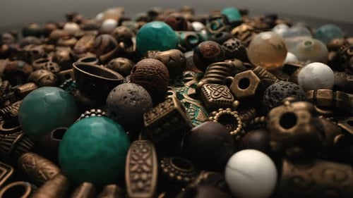 Close-up View of a Pile of Colorful Vintage Beads and Ornaments