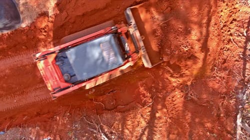 Excavator Digging Red Dirt Aerial Birds Eye View