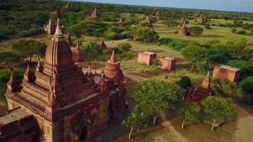 Revealing Aerial Over Landscape Filled with Dozens of Temple Pagodas in Bagan, Myanmar