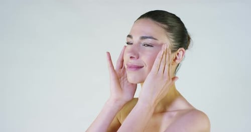 Portrait of a beautiful young girl, perfectly well-groomed, clean skin after spa treatments, on a