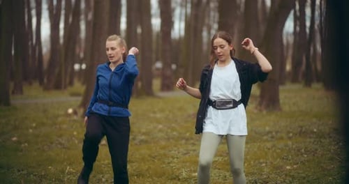 Two Woman Workout Exercising In Park Jogging Fitness