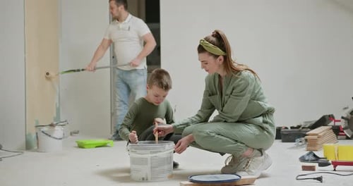 Family Renovates Room Together with Paint
