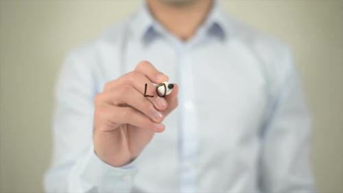 Man Writes Local Marketing on Glass Surface